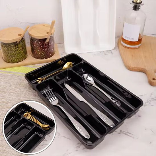 petit range couvert plastique noir