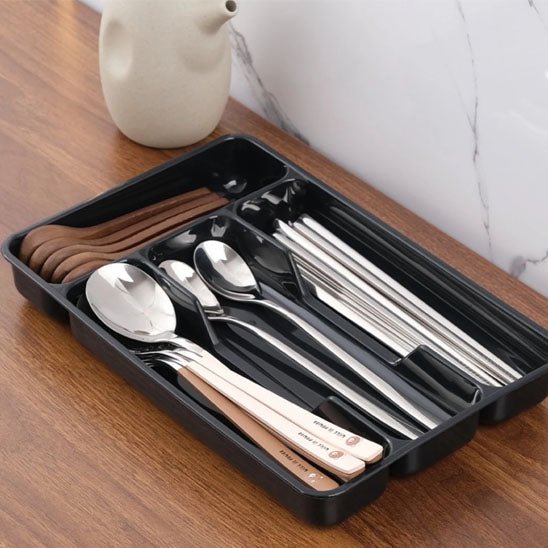 petit range couvert plastique noir
